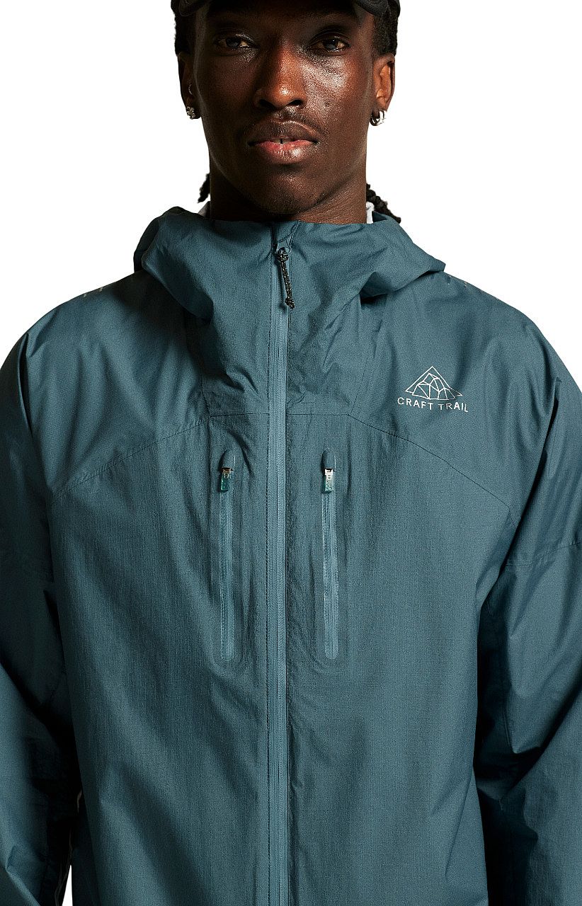 114840-Craft-PRO-Trail-2L-lichte-hardloopjack-blauw-heren-afbeelding-4