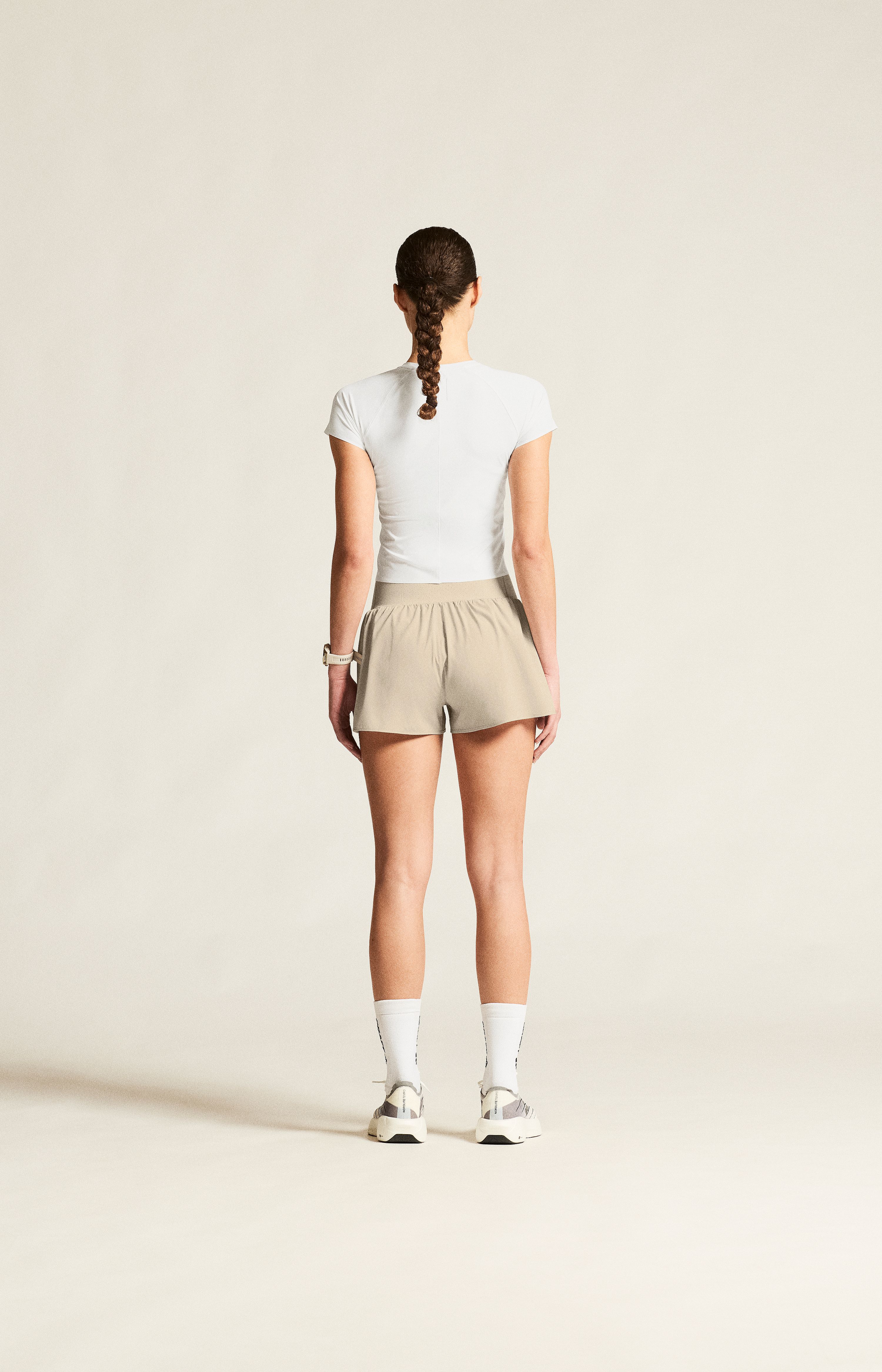 142688-Craft-hypervent-wide-hardloopbroek-kort-dames-plaster-afbeelding-4