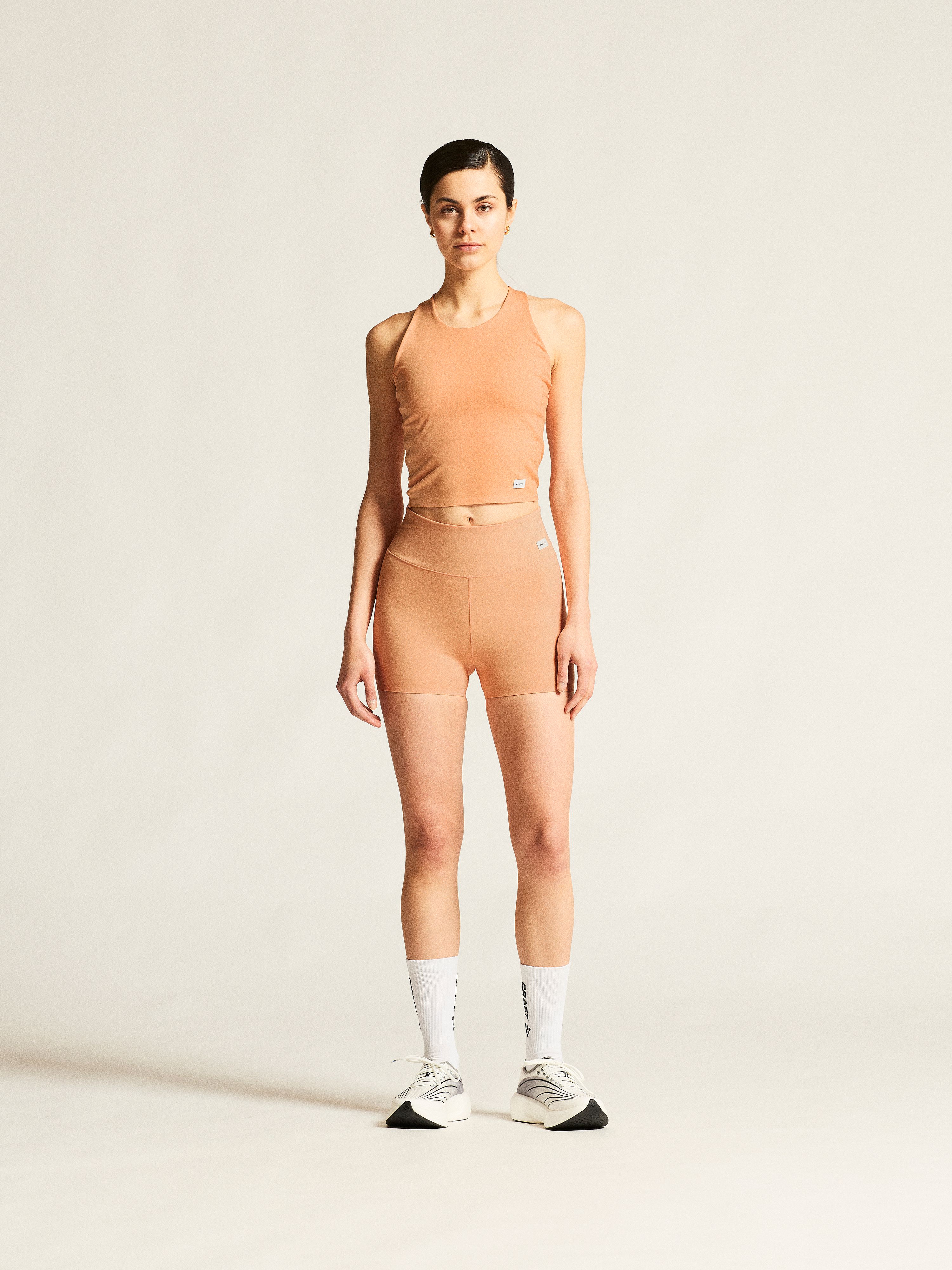 142383-Craft-collective-hardloopbroek-kort-dames-apricot-afbeelding-3