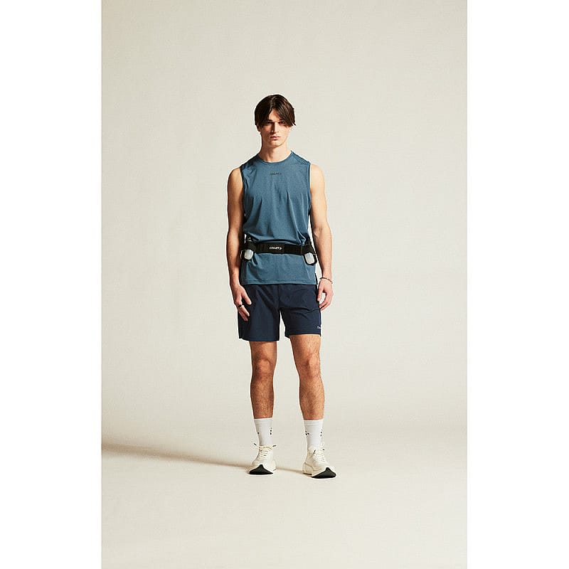 120132-Craft-ADV-Essence-2-hardloopshirt-mouwloos-blauw-heren-afbeelding-2